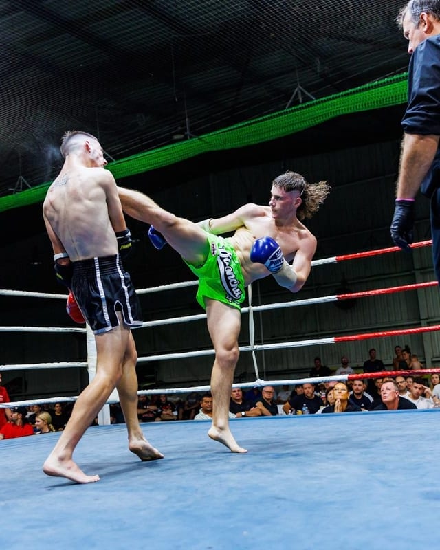 Joshua landing a kick in the ring